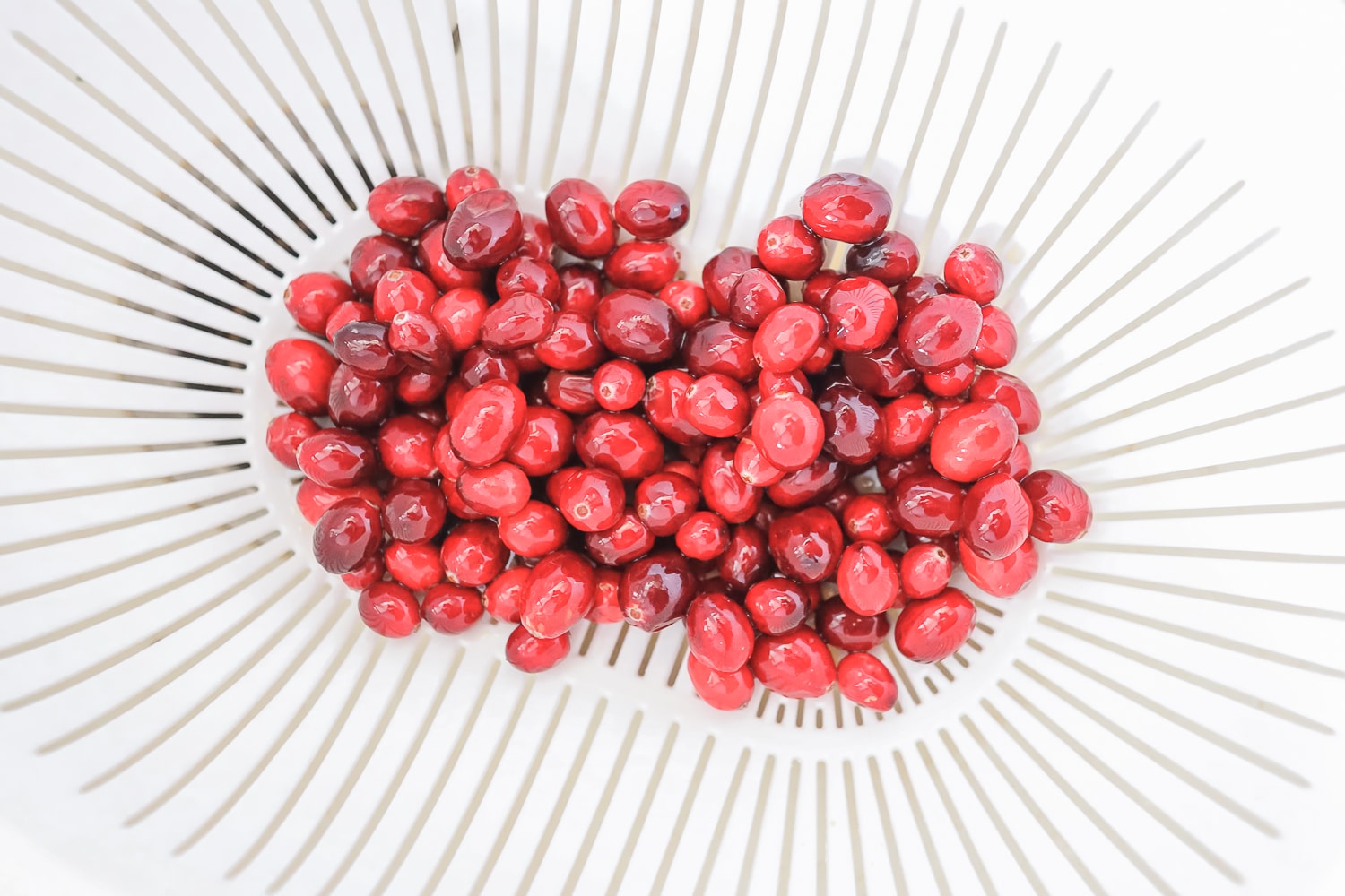 Step one of blogger Stephanie Ziajka's easy sugared cranberries recipe on Diary of a Debutante