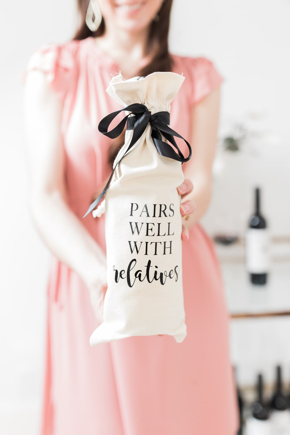 DIY wine bottle gift bags tutorial for fall by blogger Stephanie Ziajka on Diary of a Debutante