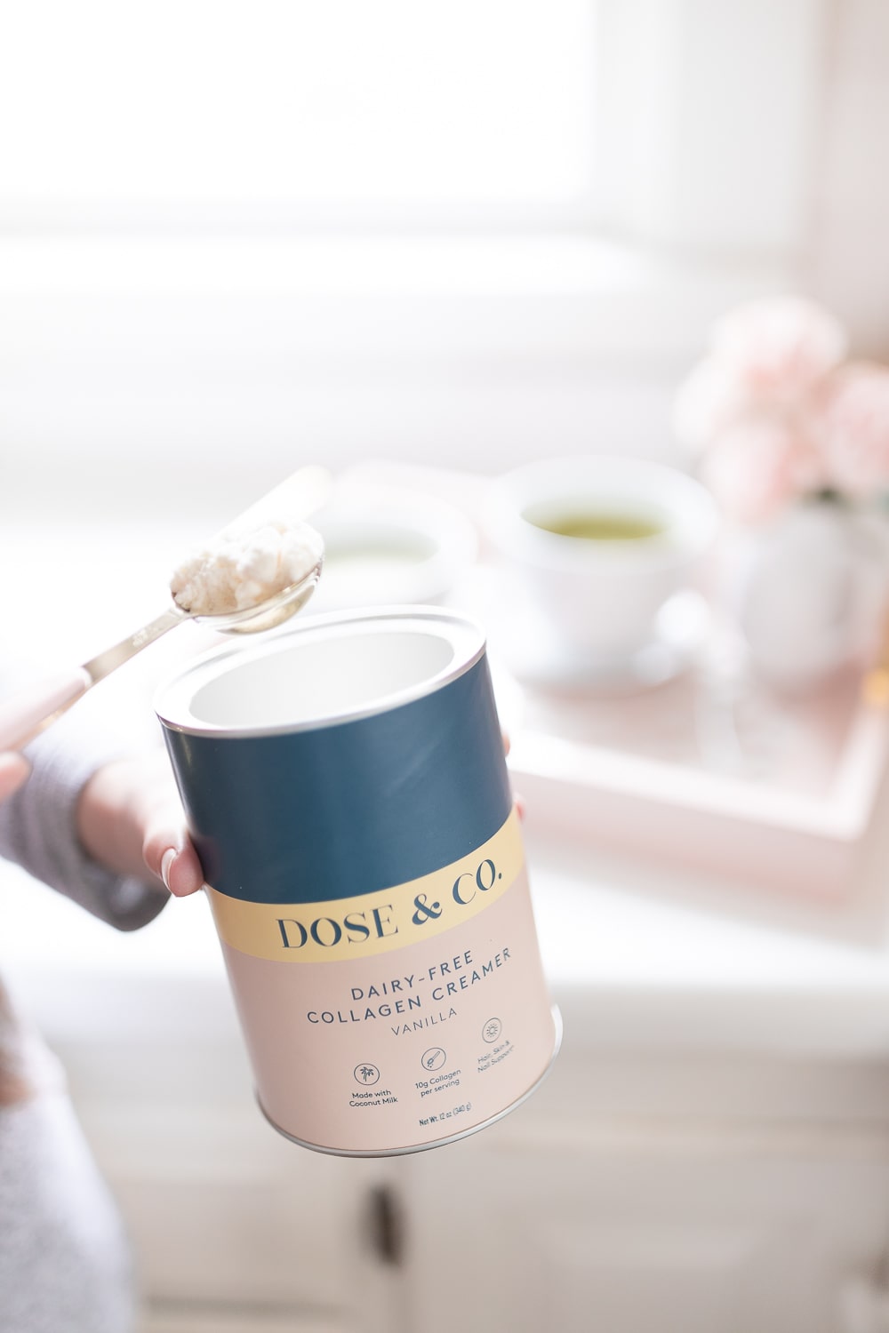 Blogger Stephanie Ziajka puts Dose & Co Vanilla Dairy-Free Collagen Creamer in her hot matcha latte on Diary of a Debutante