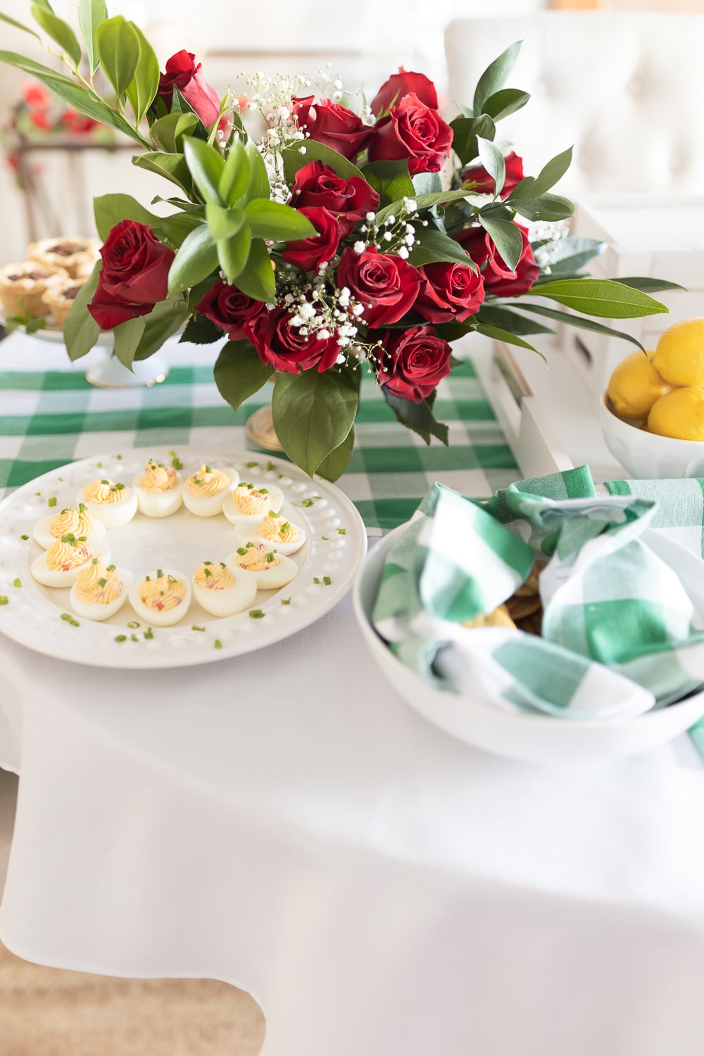 Red rose Kentucky Derby party centerpiece designed by southern blogger Stephanie Ziajka on Diary of a Debutante