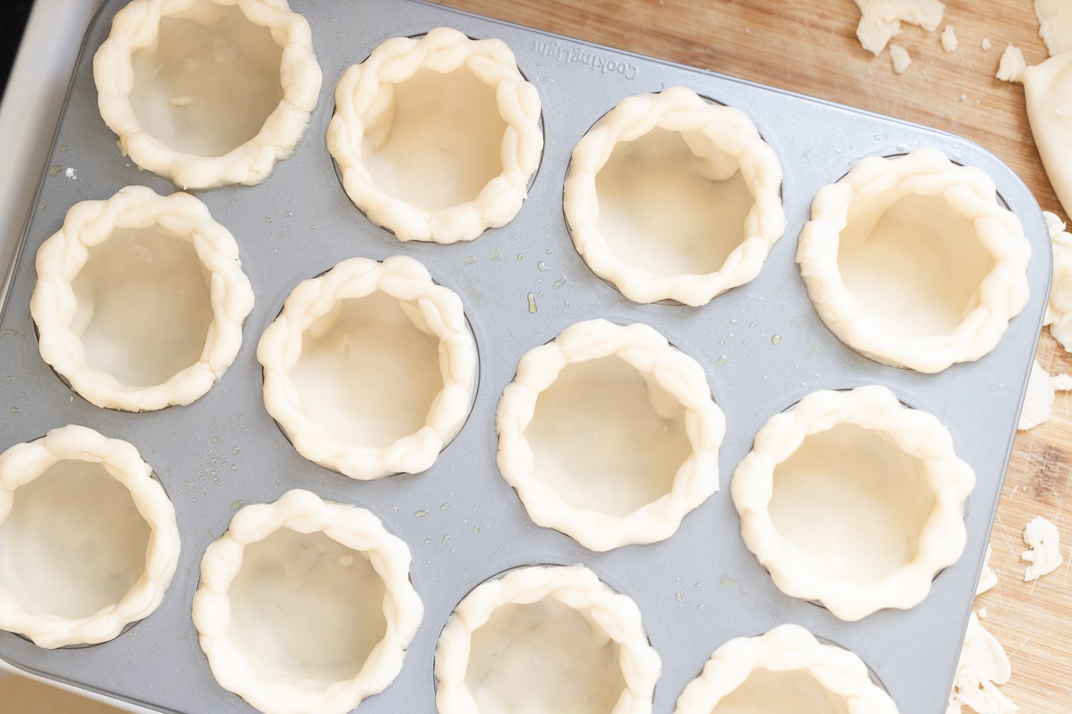 Blogger Stephanie Ziajka shows how to make mini pies in a muffin tin on Diary of a Debutante
