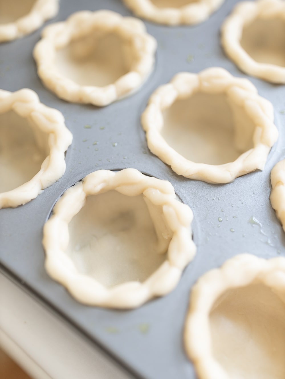 Blogger Stephanie Ziajka shows how to make mini pecan pies in muffin tins on Diary of a Debutante