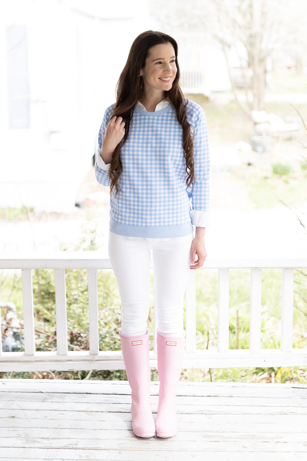 Pink rain boots outfit styled by preppy fashion blogger Stephanie Ziajka on Diary of a Debutante