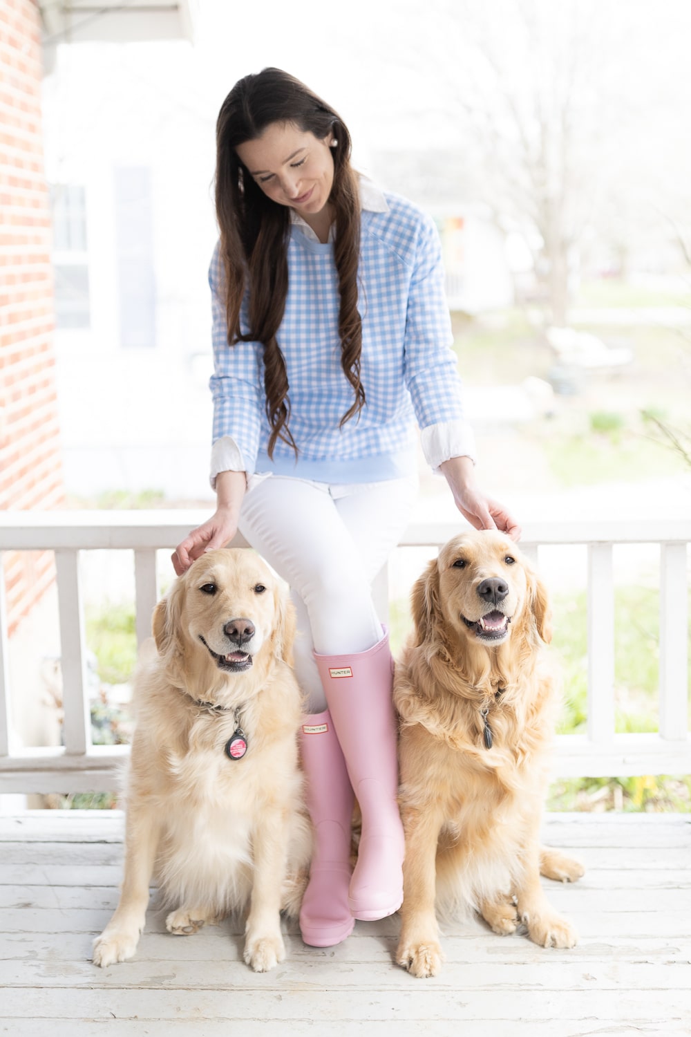 Preppy fashion blogger Stephanie Ziajka with her two golden retriever puppies, Nala and Nellie, on Diary of a Debutante