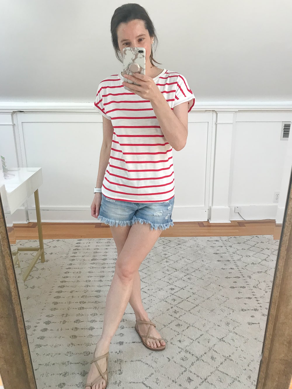 Affordable fashion blogger Stephanie Ziajka tries on an Amazon red and white striped tee on Diary of a Debutante