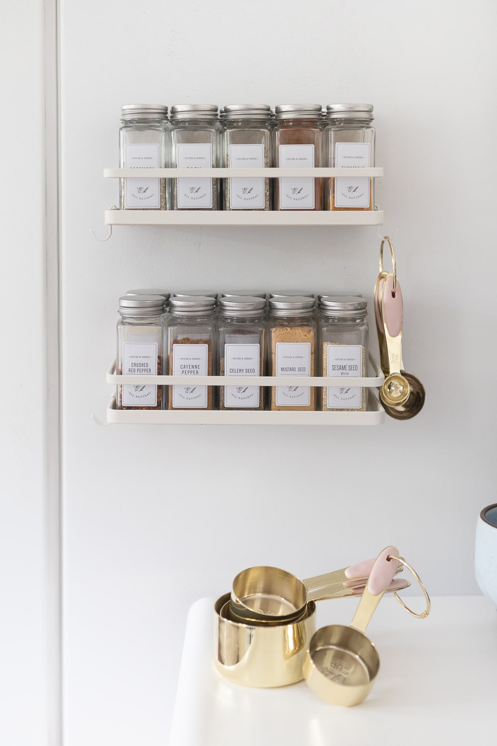 Blogger Stephanie Ziajka shares her magnetic spice jar organizer on Diary of a Debutante