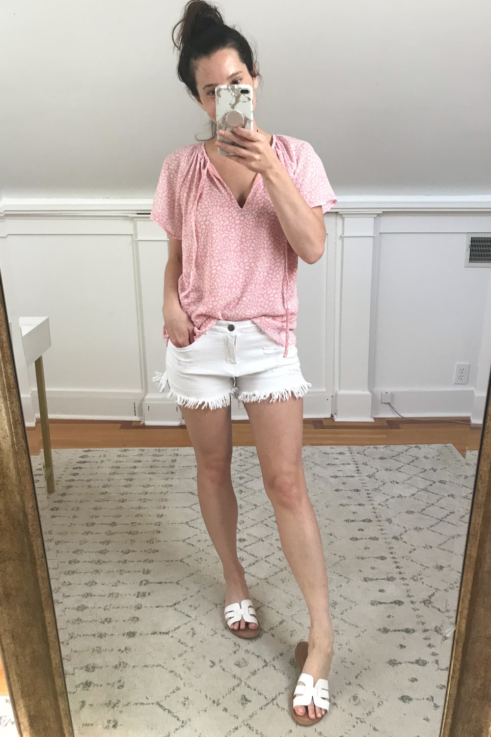 Affordable fashion blogger Stephanie Ziajka tries on an Amazon pink v-neck chiffon top as part of her honeymoon Amazon Fashion haul on Diary of a Debutante