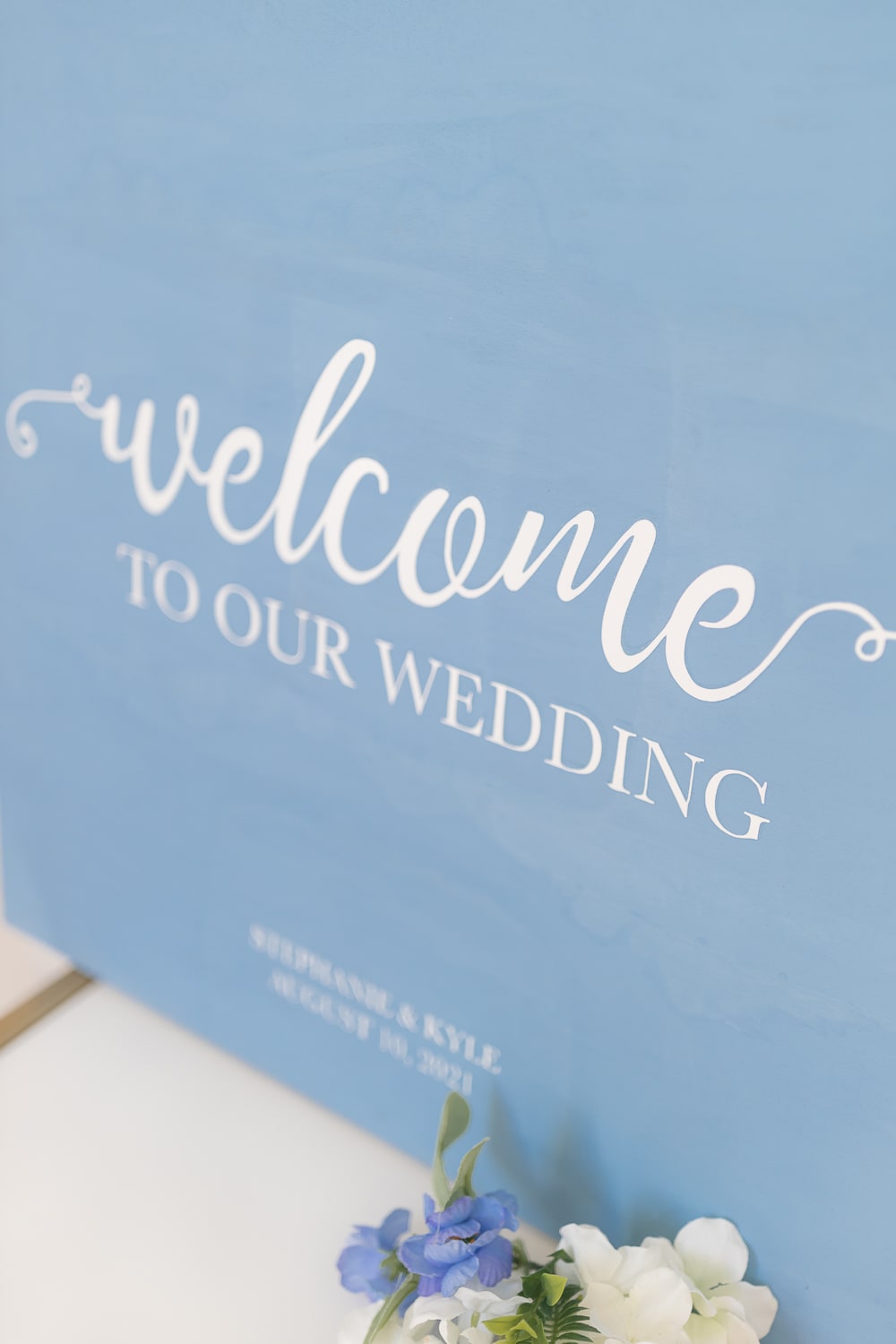 Cricut iron on instructions for making a DIY wedding welcome sign out of wood from DIY blogger Stephanie Ziajka on Diary of a Debutante