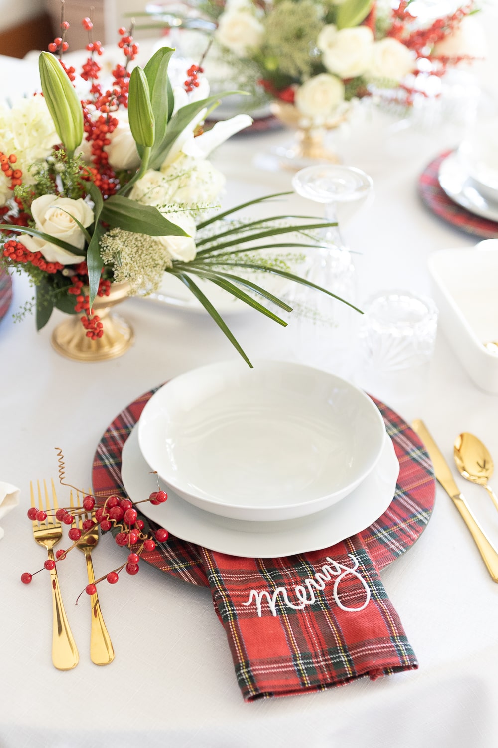 Simple holiday tablescape designed by blogger Stephanie Ziajka on Diary of a Debutante
