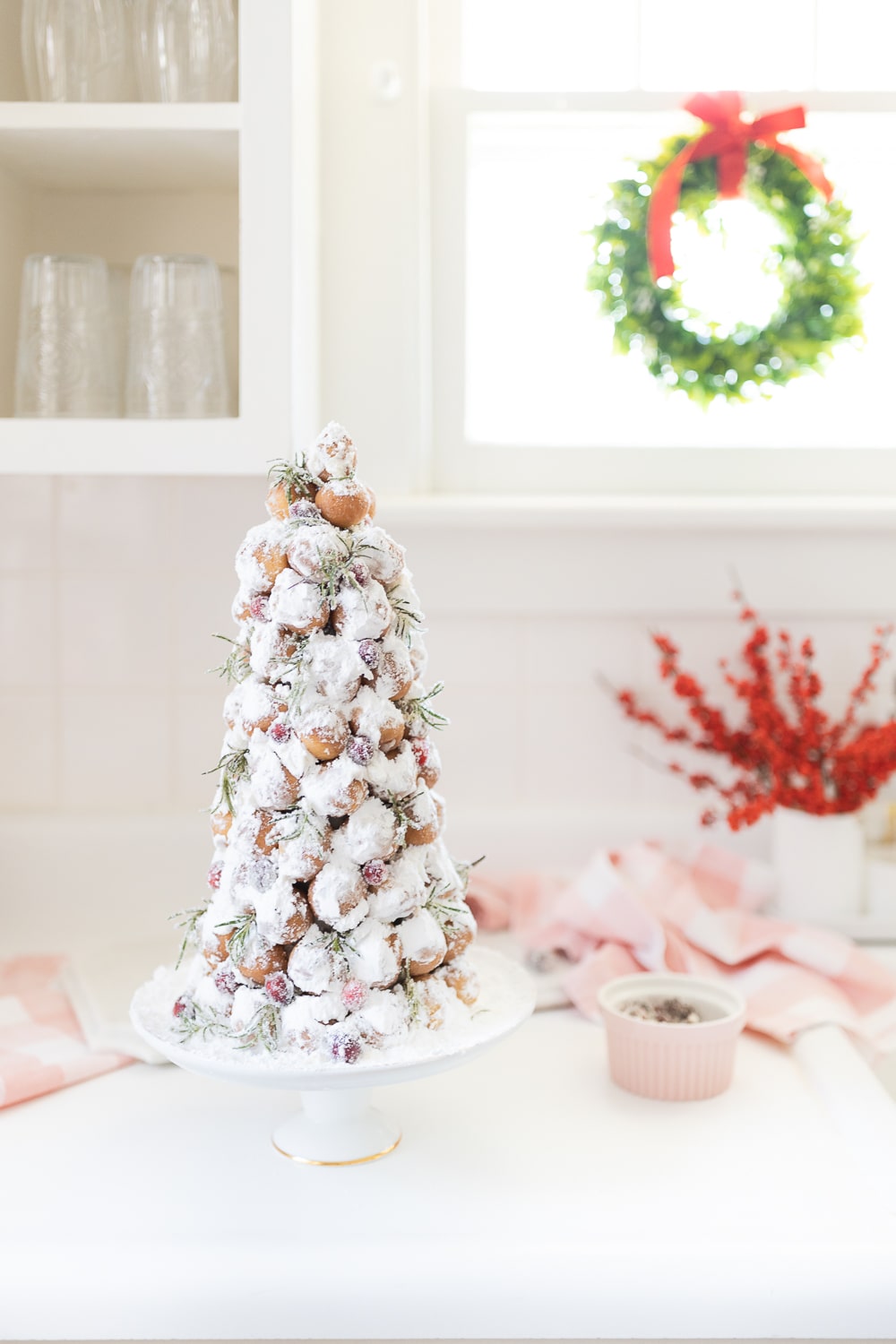 Blogger Stephanie Ziajka shows how to make your own Christmas tree dessert made out of donut holes on Diary of a Debutante