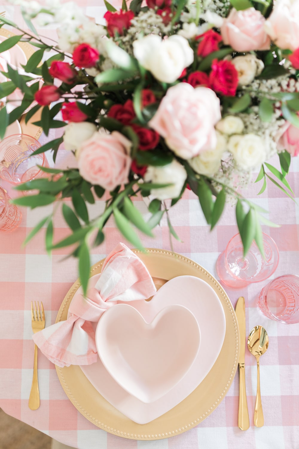 Gold and pink Valentine's Day tablescape designed by blogger Stephanie Ziajka on Diary of a Debutante