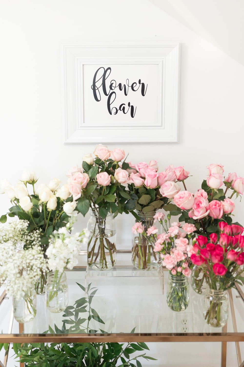 Blogger Stephanie Ziajka shows how to create a flower bar for bridal shower on Diary of a Debutante