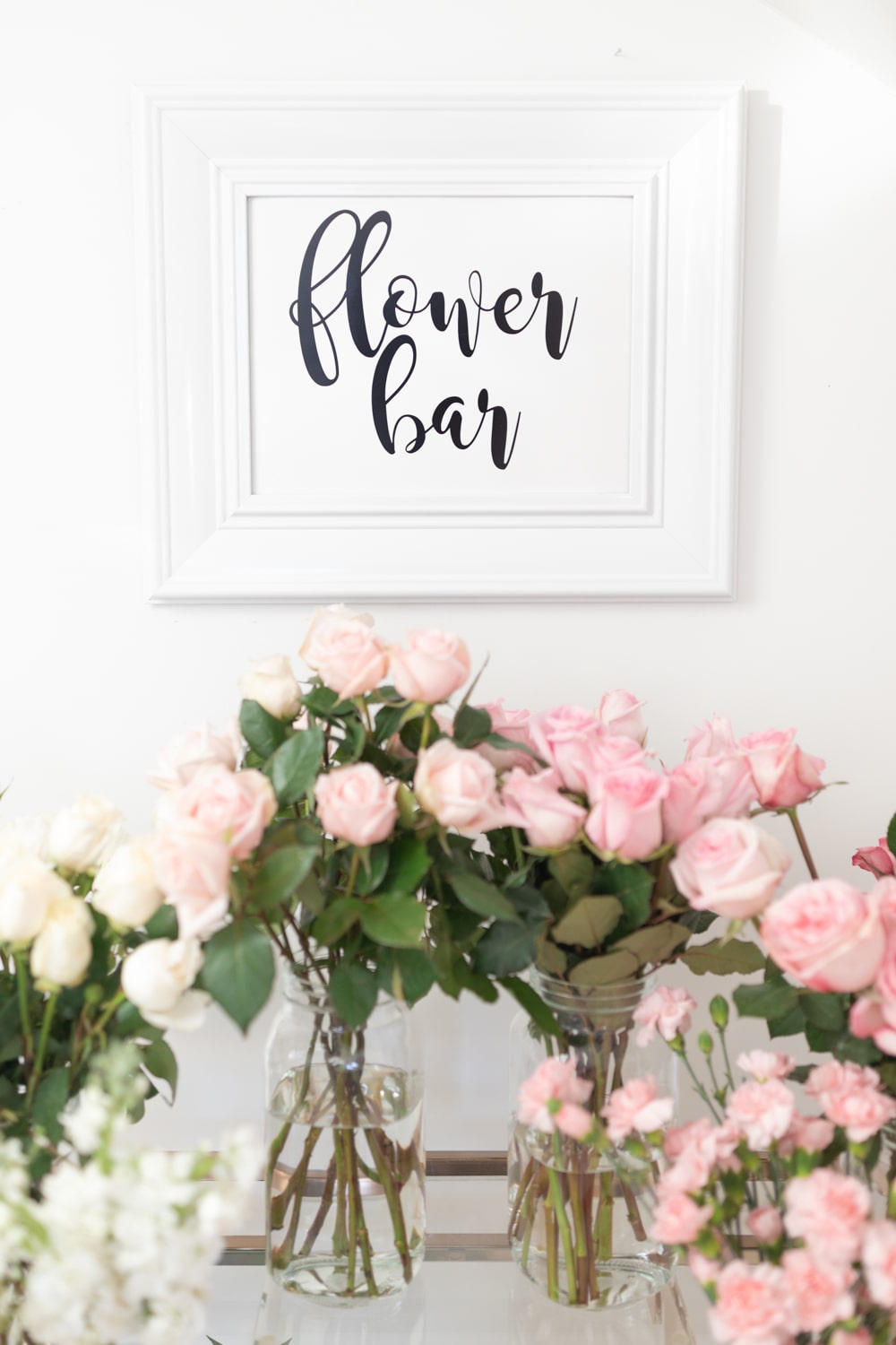 Blogger Stephanie Ziajka shows how to create a bridal shower flower bar on Diary of a Debutante