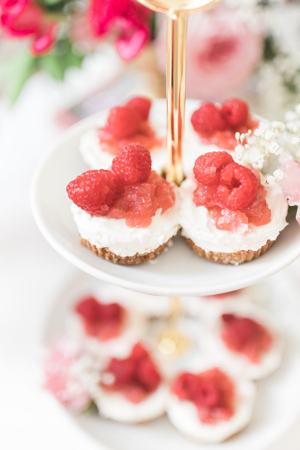 No bake mini strawberry cheesecakes served as part of a Galentine's Day menu by blogger Stephanie Ziajka on Diary of a Debutante