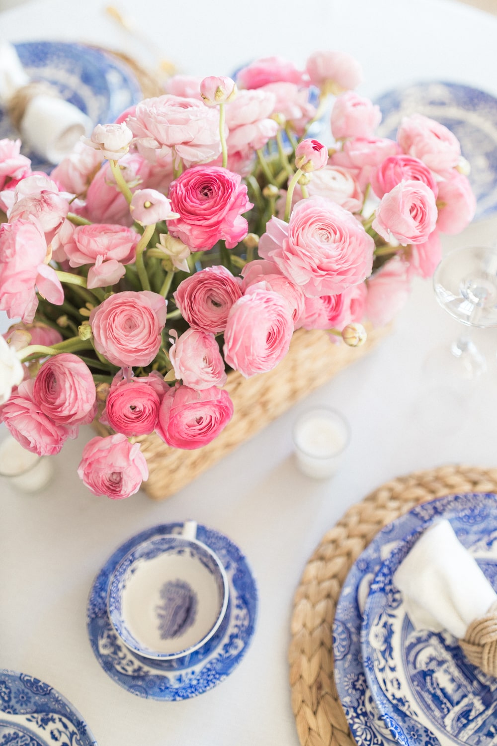 Pink ranunculus centerpiece designed as part of a valentine's day tablescape by blogger Stephanie Ziajka on Diary of a Debutante