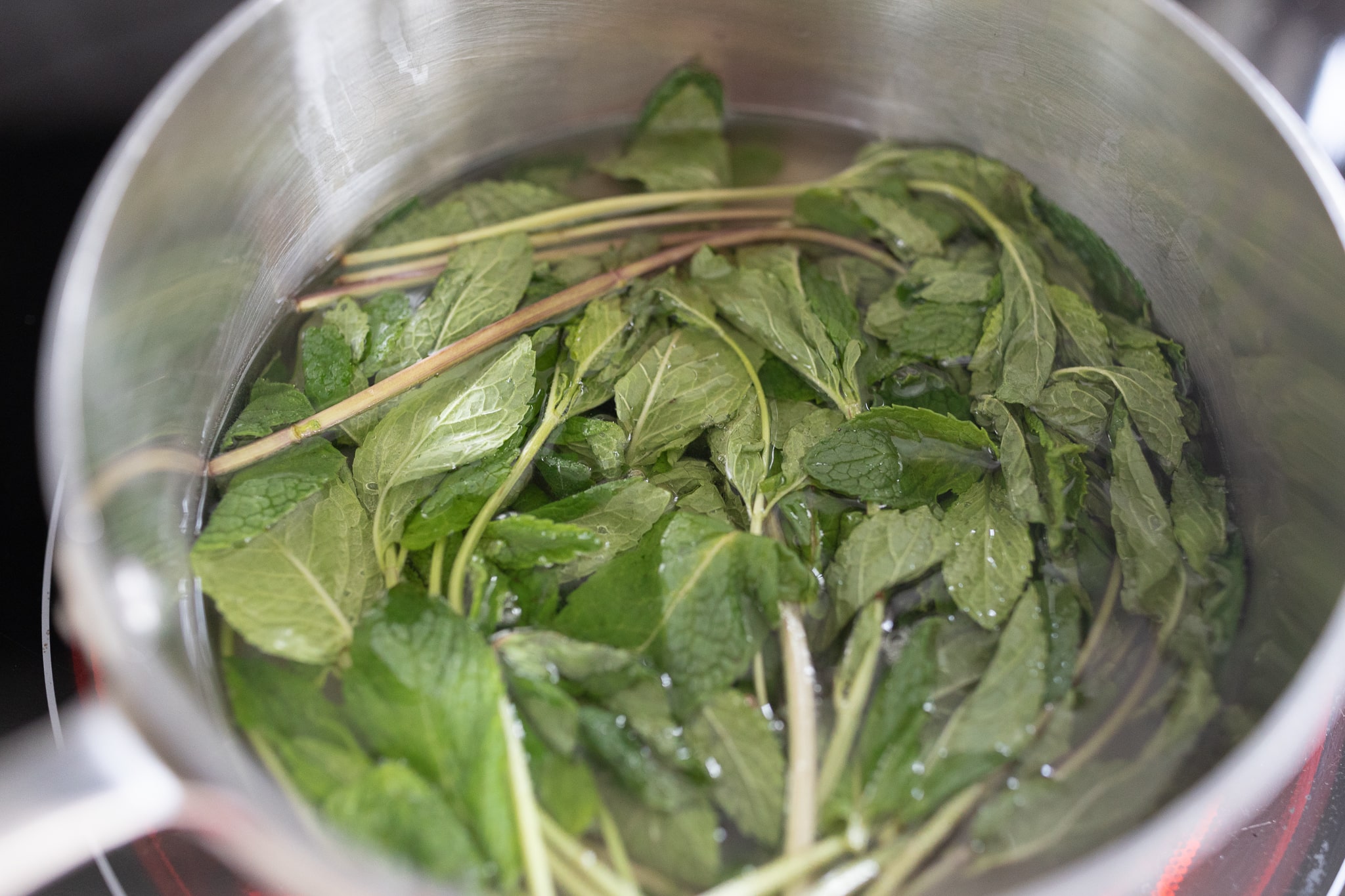 Step one of blogger Stephanie Ziajka's mint simple syrup recipe on Diary of a Debutante