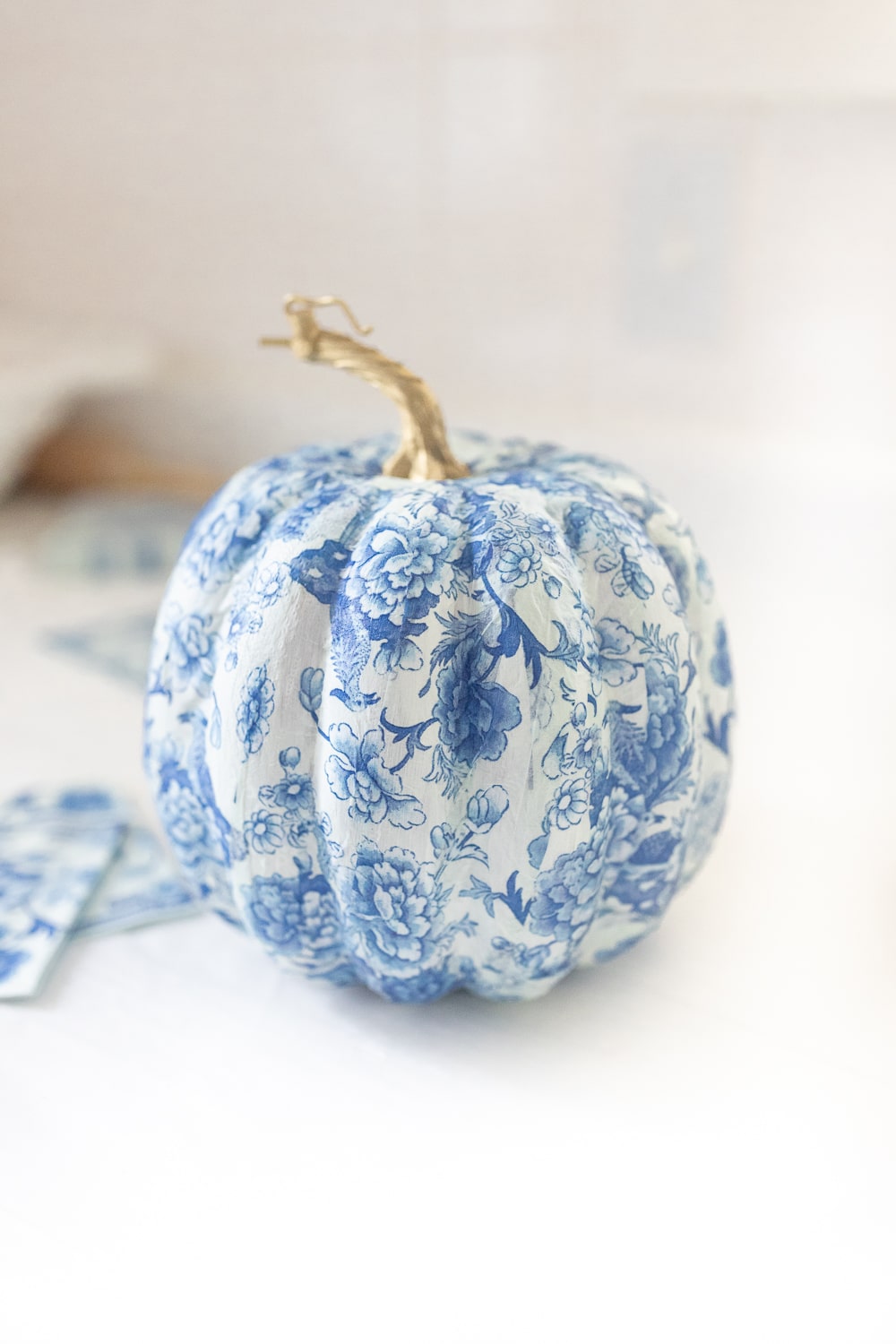 Blue and white decorative pumpkins created by blogger Stephanie Ziajka on Diary of a Debutante