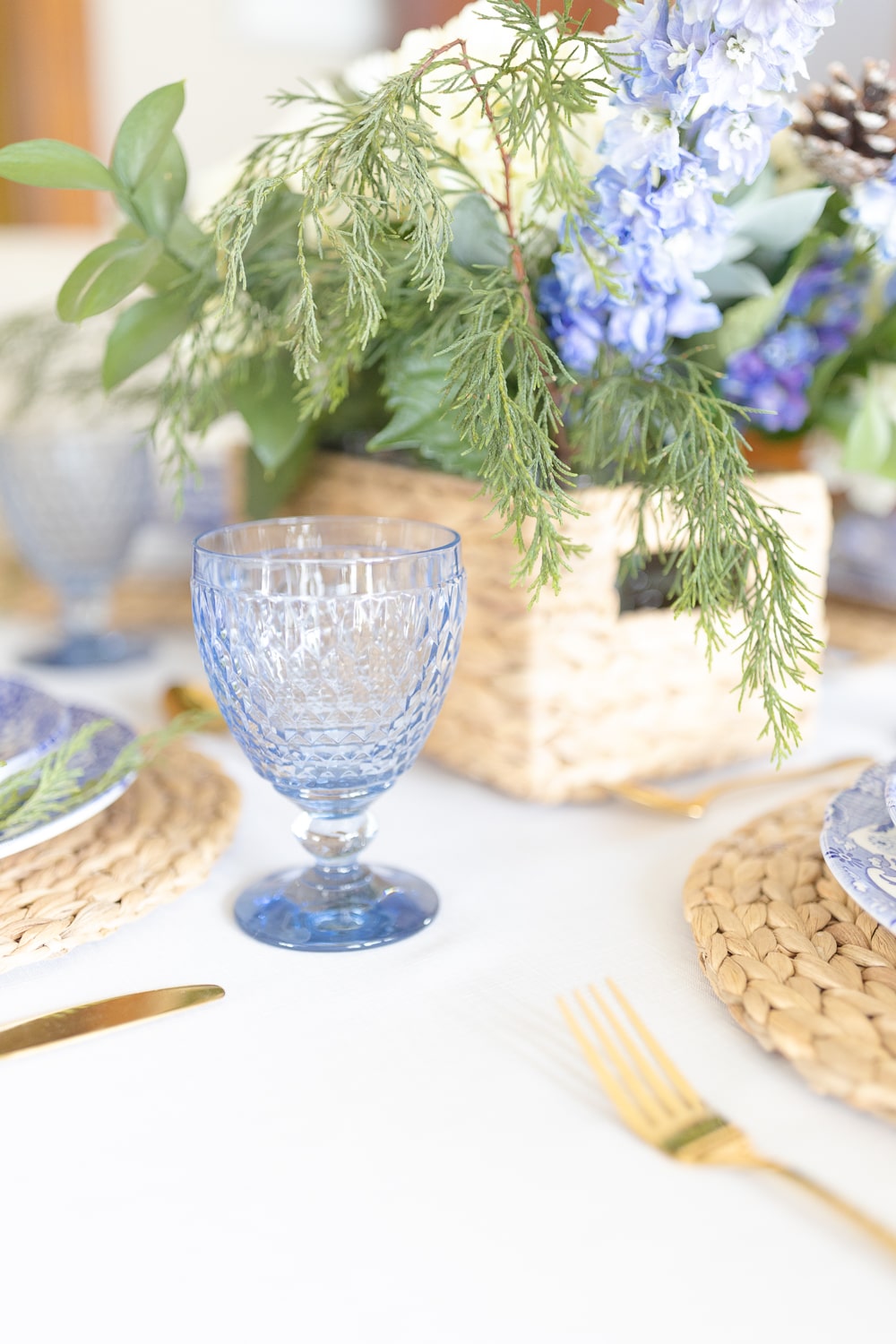 Villeroy and Boch blue goblets styled in a winter table setting by southern lifestyle blogger Stephanie Ziajka on Diary of a Debutante