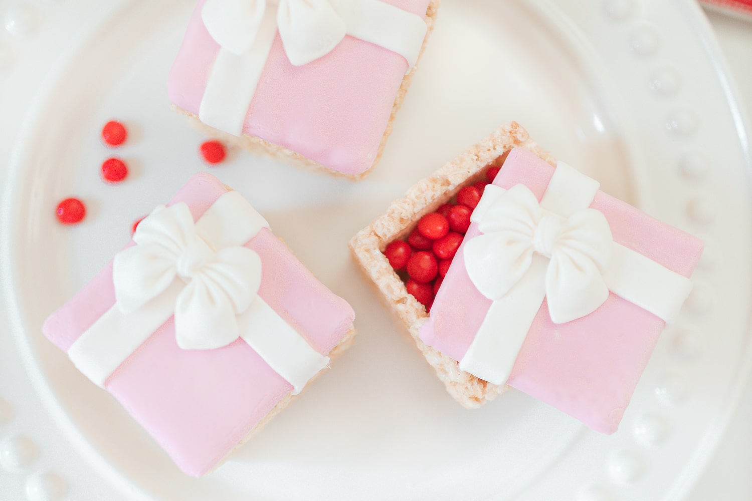Pink rice krispie treats gift boxes stuffed with cinnamon Imperials and created by southern lifestyle blogger Stephanie Ziajka on Diary of a Debutante